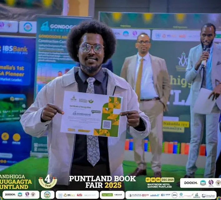 Volunteer receiving a certificate of recognition